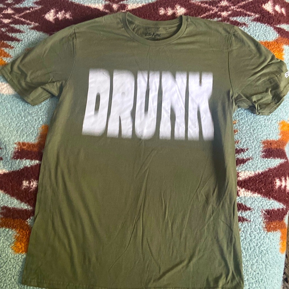 Elle king drunk shirt.  Brand new, never worn. Size medium, dark green